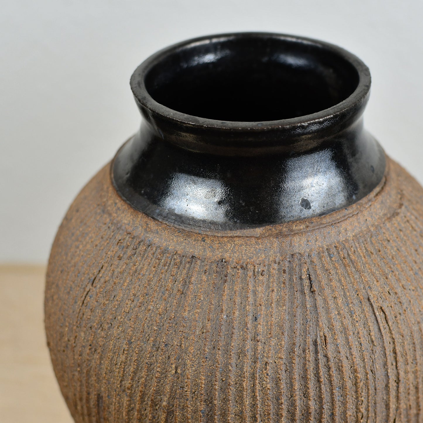 Black and Tan Fluted Vase