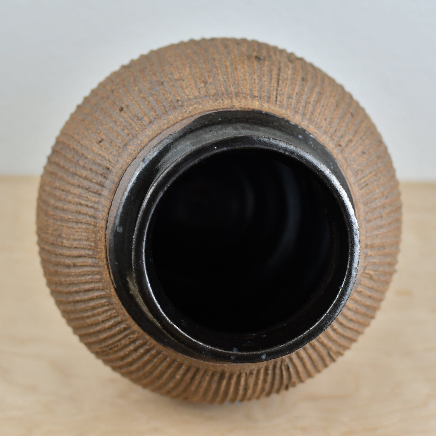 Black and Tan Fluted Vase